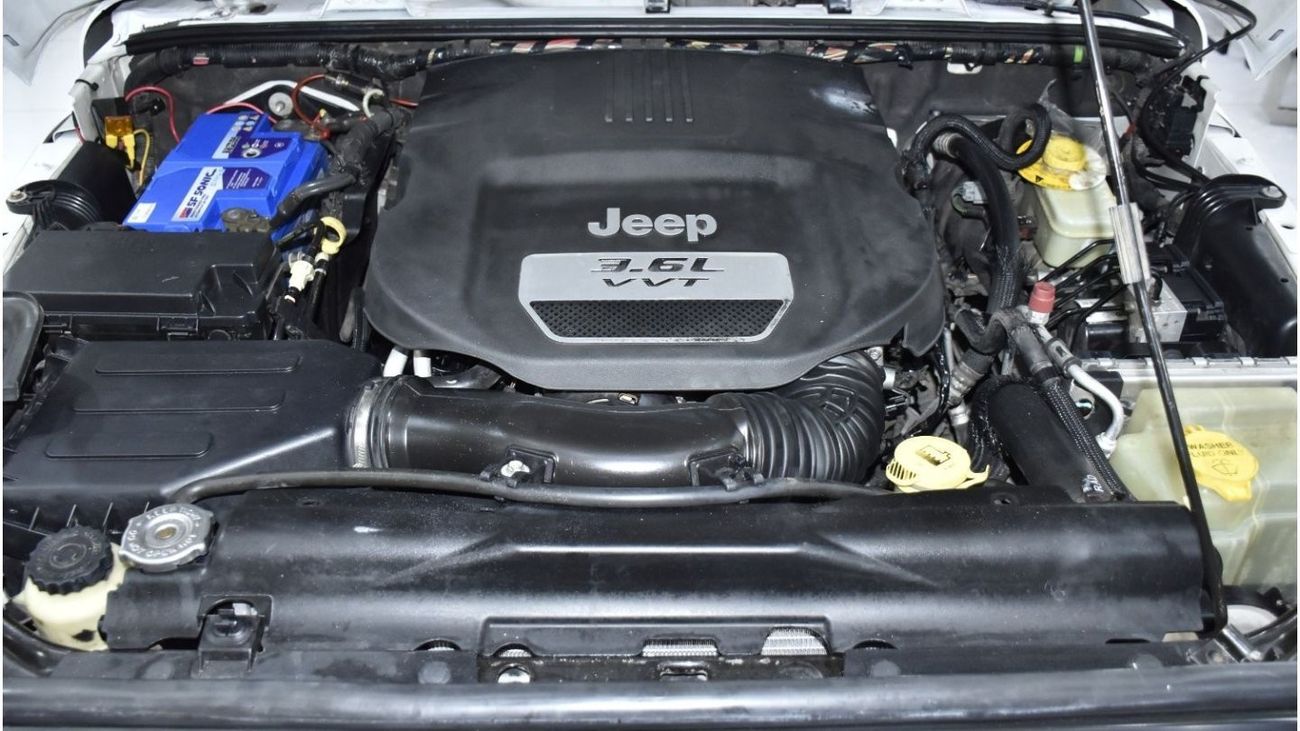 Jeep Wrangler EXCELLENT DEAL for our Jeep Wrangler Sport ( 2014 Model ) in White Color GCC Specs