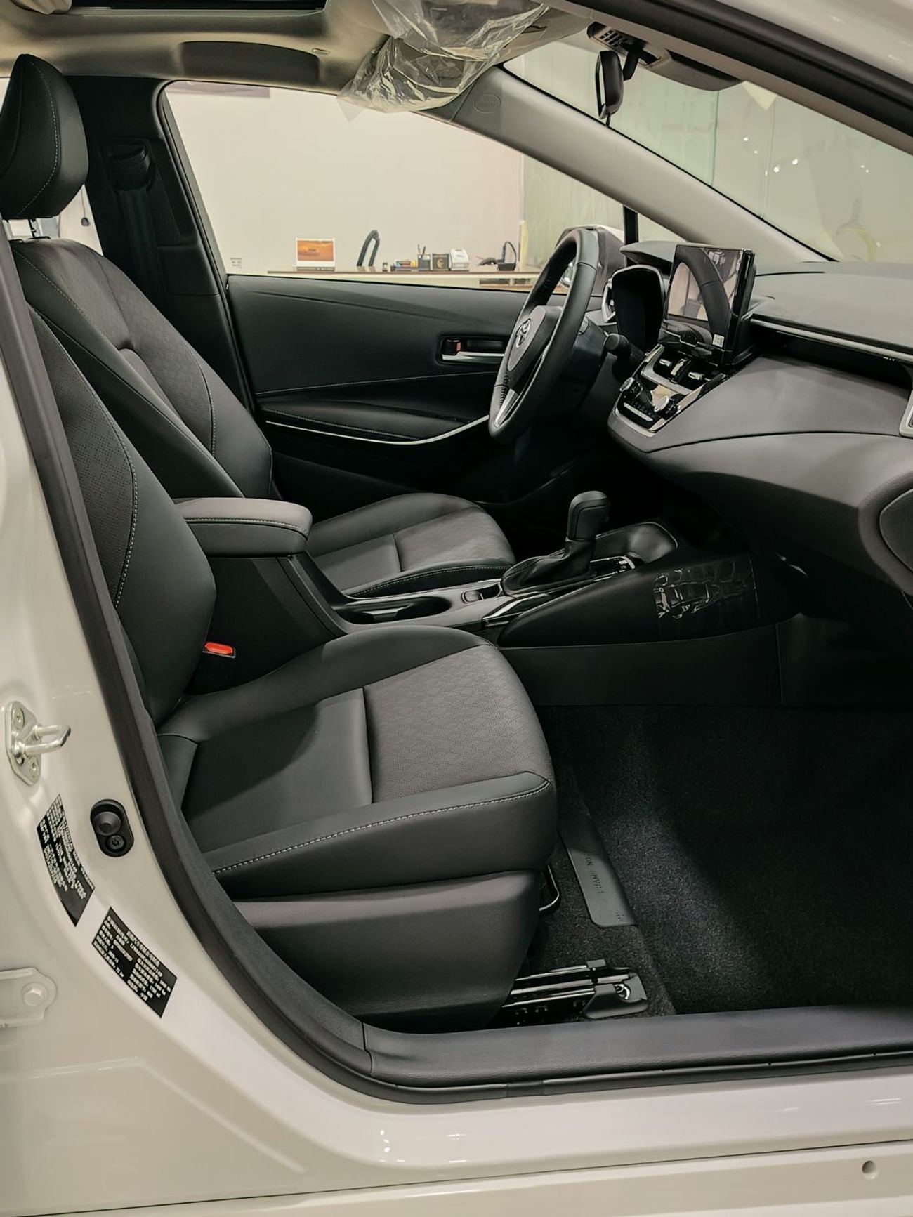 تويوتا كورولا GLI Moonroof Hybrid 1.8L