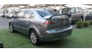 Mitsubishi Lancer Gulf gray color, inside beige without accidents, rear wing sensors, fog lights, in excellent conditi