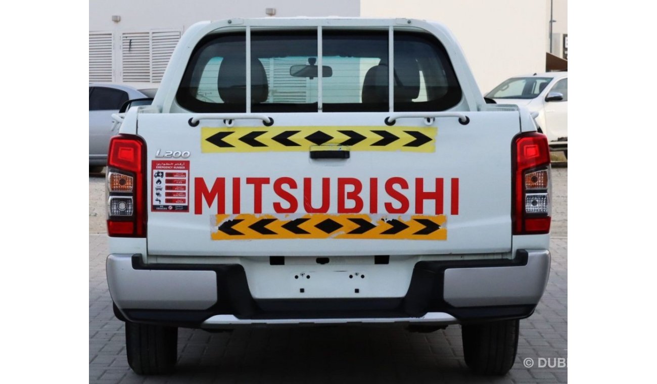 Mitsubishi L200 GL AUTOMATIC WINDOWS - MANUAL GEARBOX - 2WD - PERFECT CONDITION INSIDE OUT - GCC