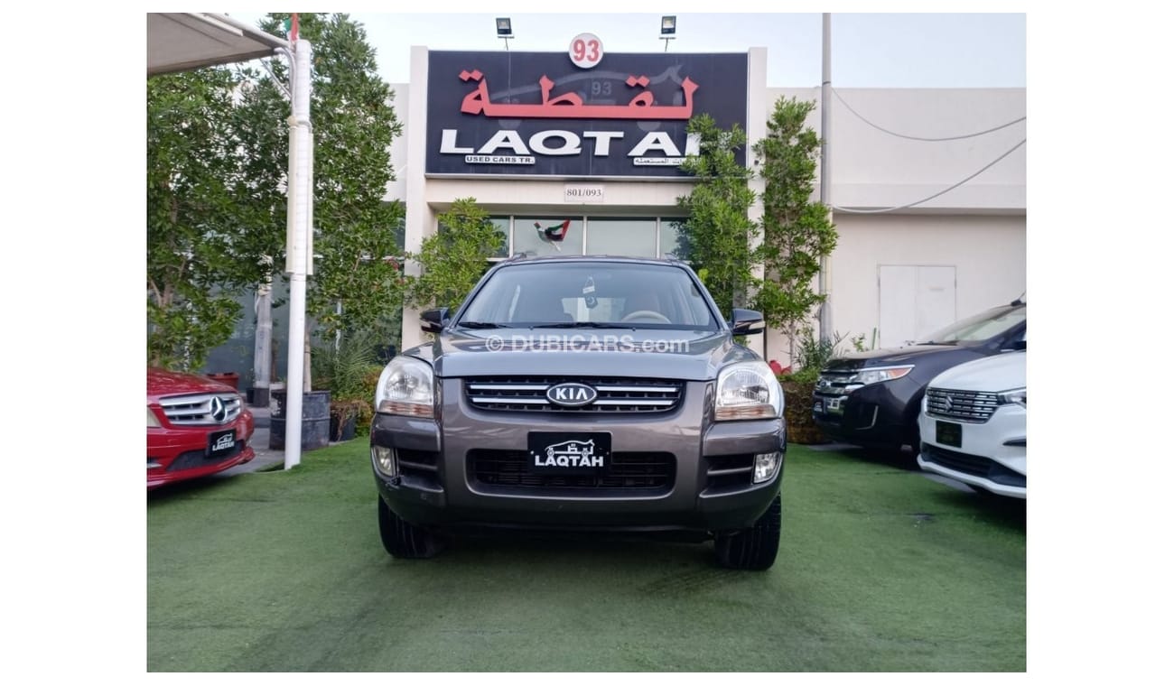 Kia Sportage 2008 model, Gulf agency, gray color, beige interior, in excellent condition, alloy wheels, rear sens