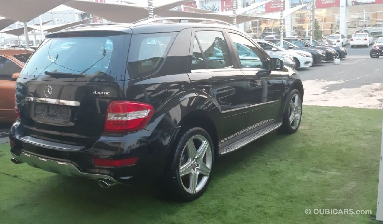 مرسيدس بنز ML 350 خليجى 2009 صبغ وكالة  بدون حوادث رقم واحد جلد فتحة جناح خلفي جميع حساسات بحالة ممتازة