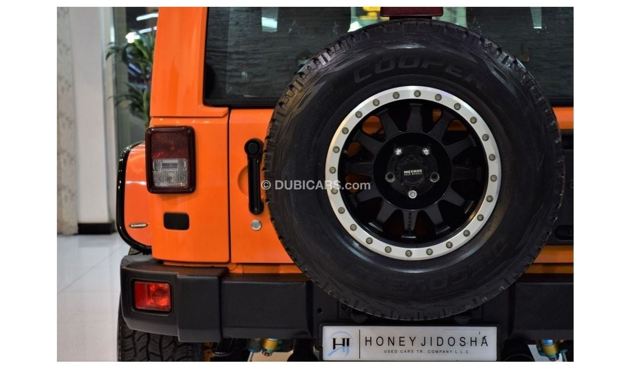 Jeep Wrangler EXCELLENT DEAL for our Jeep Wrangler SAHARA 2013 Model!! in Orange Color! GCC Specs