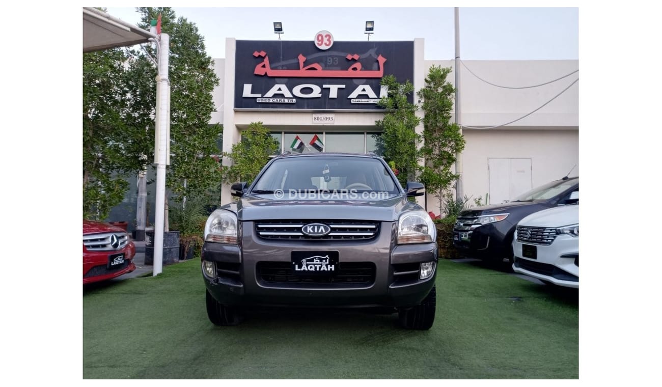 Kia Sportage 2008 model, Gulf agency, gray color, beige interior, in excellent condition, alloy wheels, rear sens