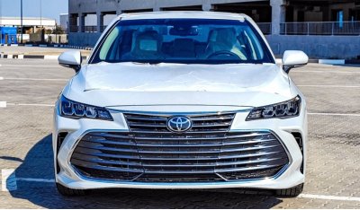 Toyota Avalon XLE Особенности интерьера   ABS+EBD+BA+VSC+TRC+HSA(HiII Start Assist)   Розетка для аксессуаров   По