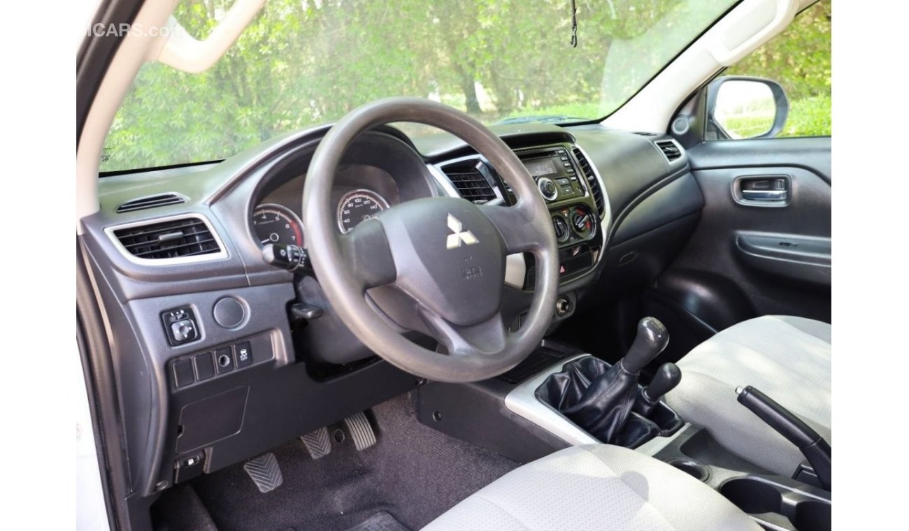 Mitsubishi L200 | 4x4 | Power Locks, Windows, Mirror | Petrol Engine | Excellent Condition | GCC