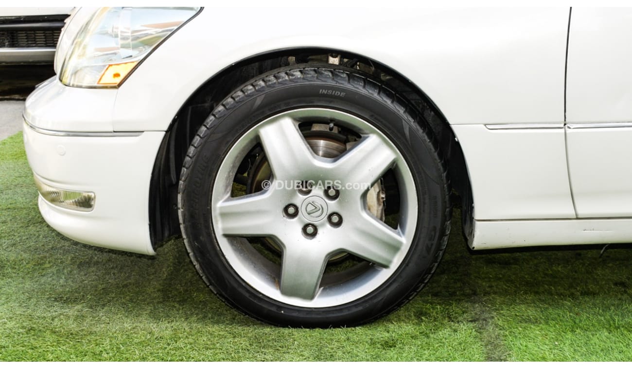 لكزس LS 430 وارد 1/2 الترا موديل 2006 لون أبيض فتحة جلد رنجات خشب مرايا كهرباء كرسي كهرباء بحالة ممتازة