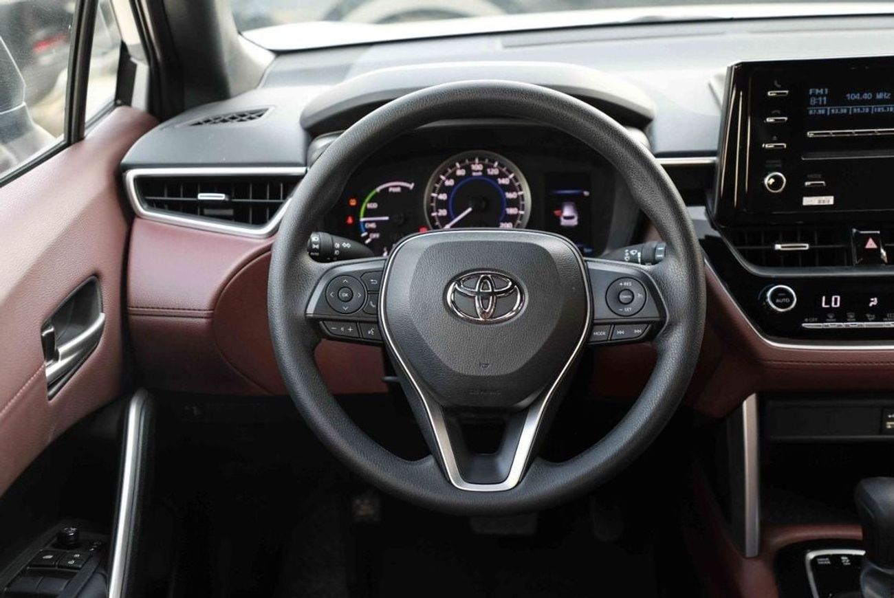 تويوتا كورولا كروس 2024 TOYOTA COROLLA CROSS 1.8 Hybrid MID - SILVER inside RED | Export Only