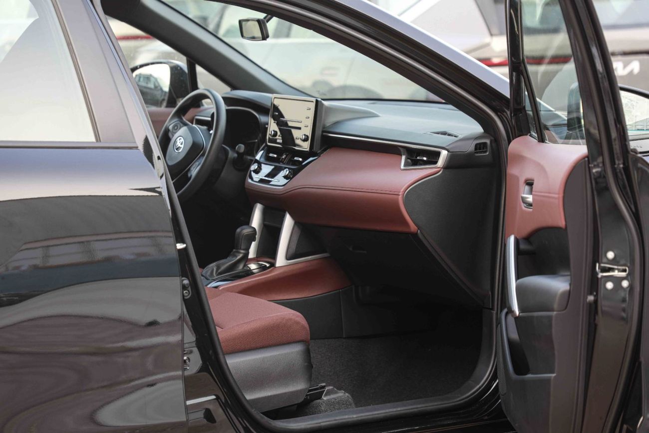 تويوتا كورولا كروس 1.8 Hybrid Mid - Black Inside Red | Export Only