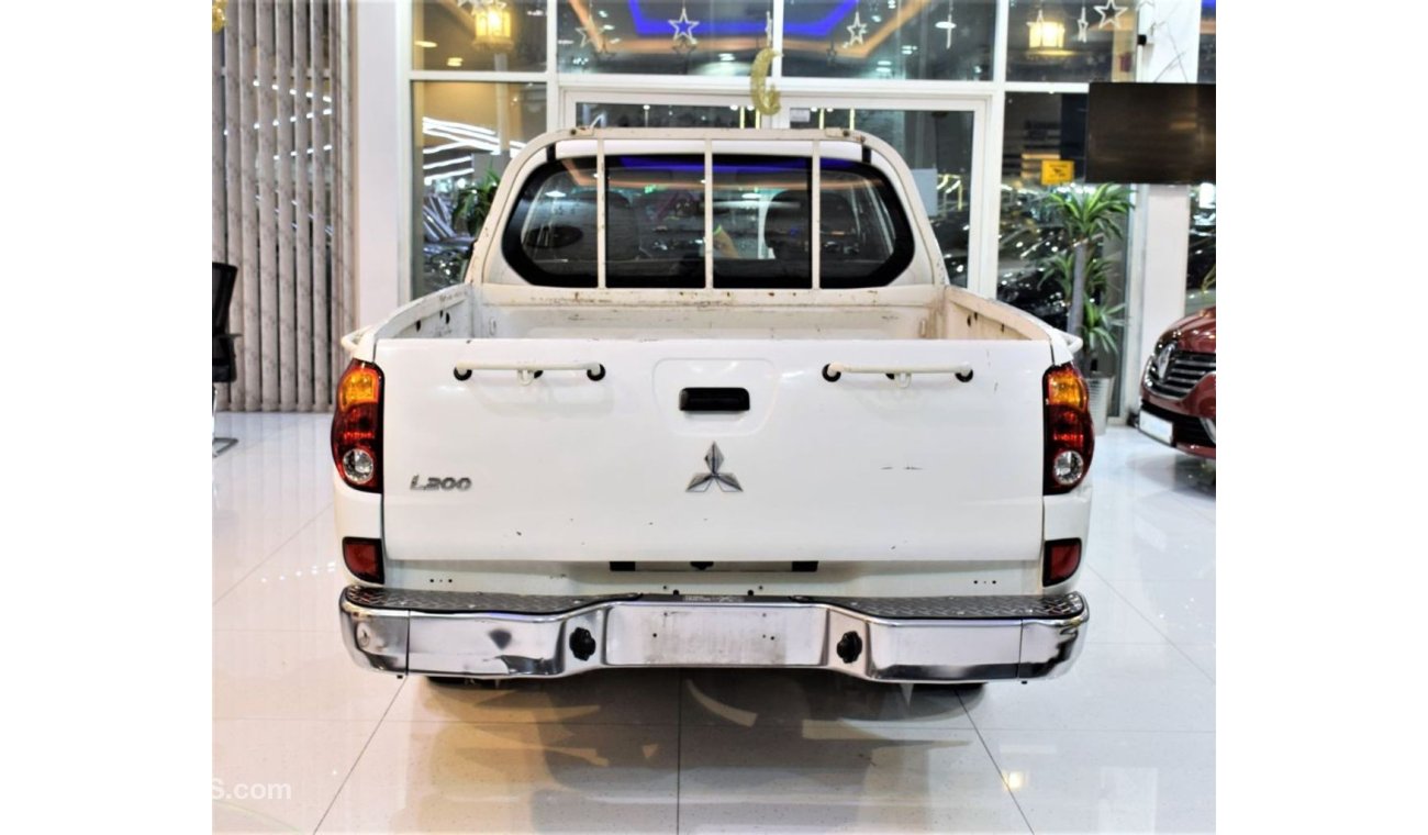 Mitsubishi L200 PERFECT FOR TRANSPORTING ITEMS! Mitsubishi L200 2013 Model!! in White Color! GCC Specs