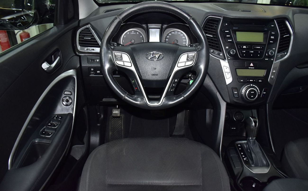 Hyundai Santa Fe EXCELLENT DEAL for our Hyundai SantaFe 4WD 3.3L ( 2014 Model ) in Black Color GCC Specs