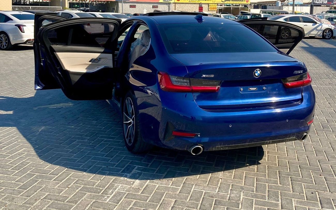 BMW 330i X drive exclusive very low km