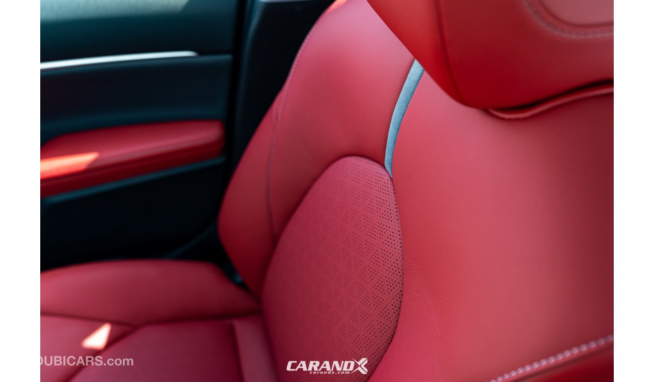 Toyota Camry XSE Hybrid Black / Red Interior