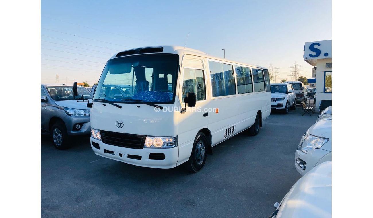 Toyota Coaster 30 SEATER------4.2L-DIESEL------LIKE BRAND NEW-DVD-REAR CAMERA-----ESPECIALMENTE PARA ANGOLA