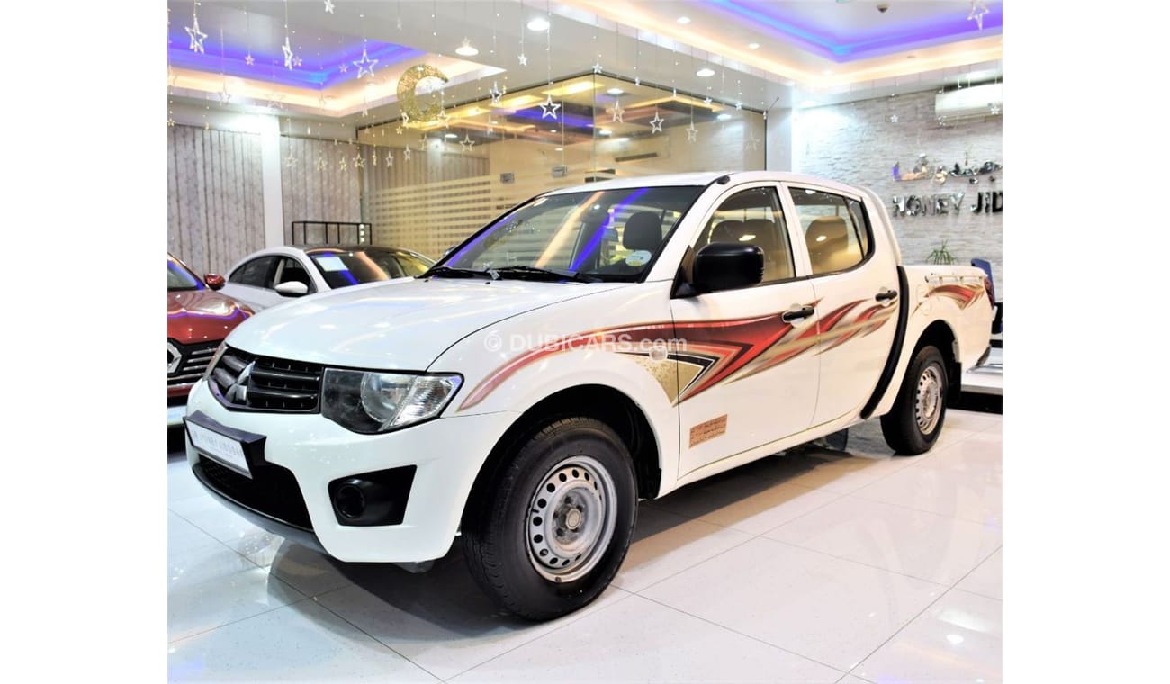Mitsubishi L200 PERFECT FOR TRANSPORTING ITEMS! Mitsubishi L200 2013 Model!! in White Color! GCC Specs