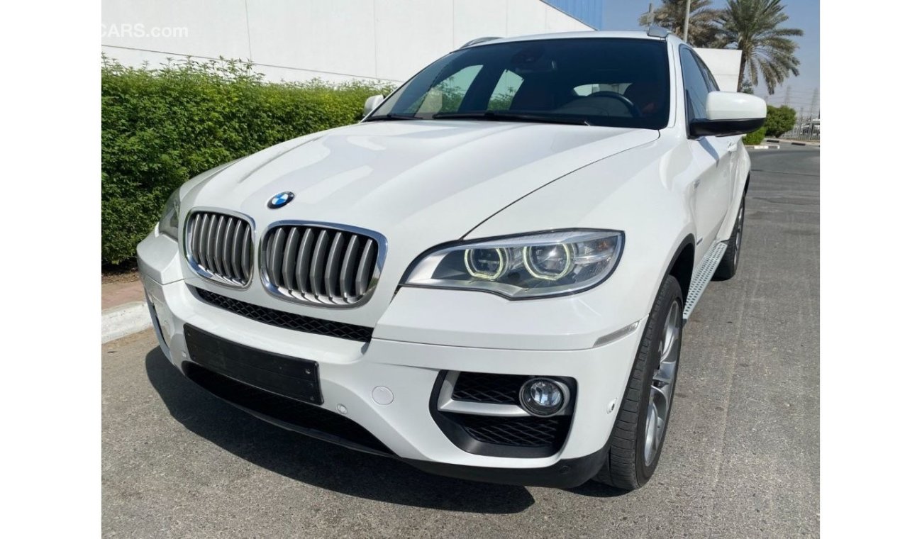 BMW X6 AED2070/month | 2014 BMW X6 XDrive50i 4.4L UNLIMITED K.M WARRANTY.