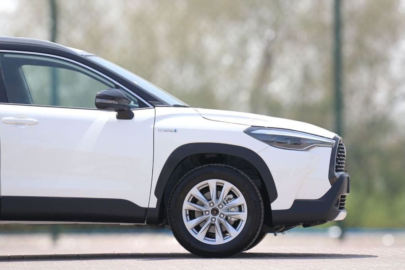 Toyota Corolla Cross Best offer for the new Corolla Cross Hybrid 2024 1.8L contact Now | Terra rosa color interior