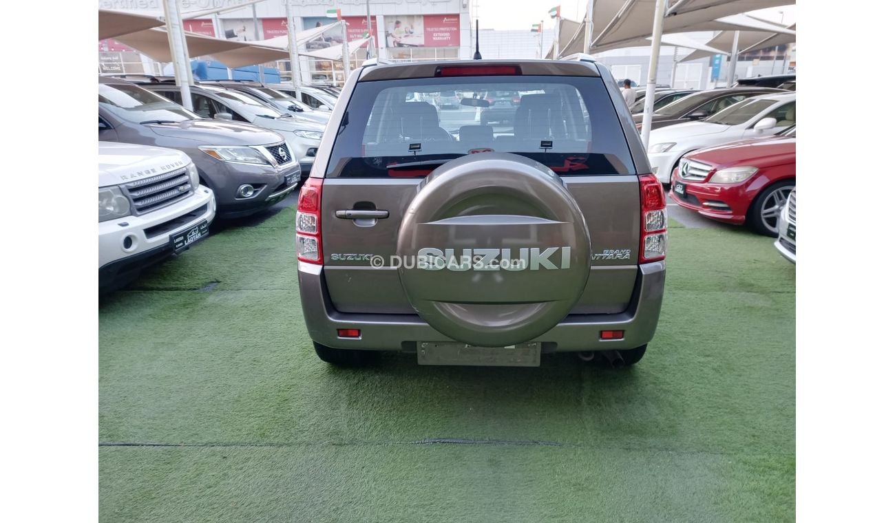 Suzuki Grand Vitara 2015 GCC model, agency dye, cruise control, alloy wheels, camera sensors, Android screen, in excelle