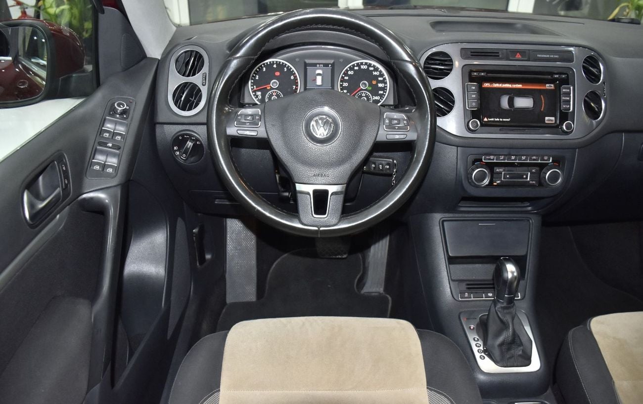 Volkswagen Tiguan SEL EXCELLENT DEAL for our Volkswagen Tiguan 2.0 TSi 4Motion ( 2014 Model ) in Red Color GCC Specs