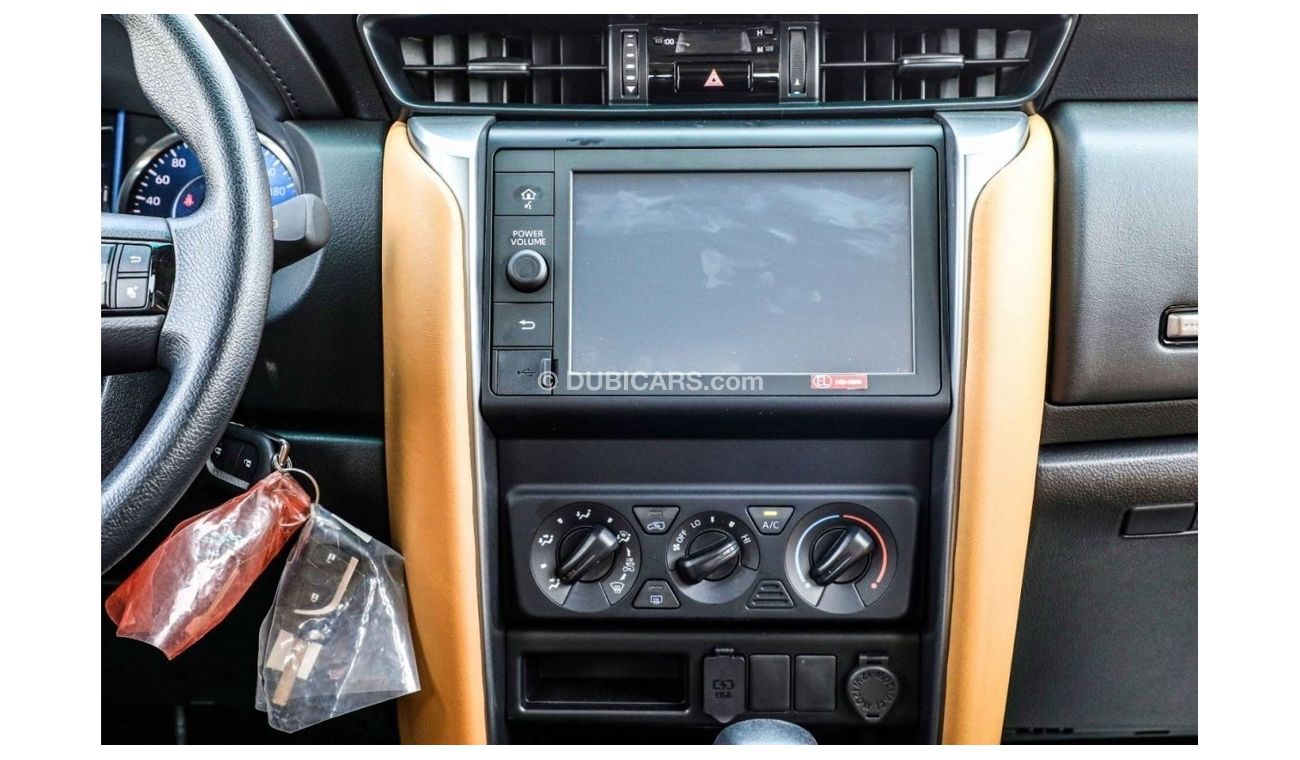 Toyota Fortuner 2023 Toyota Fortuner 2.7 4x2 P AT - Pearl White inside Chamois