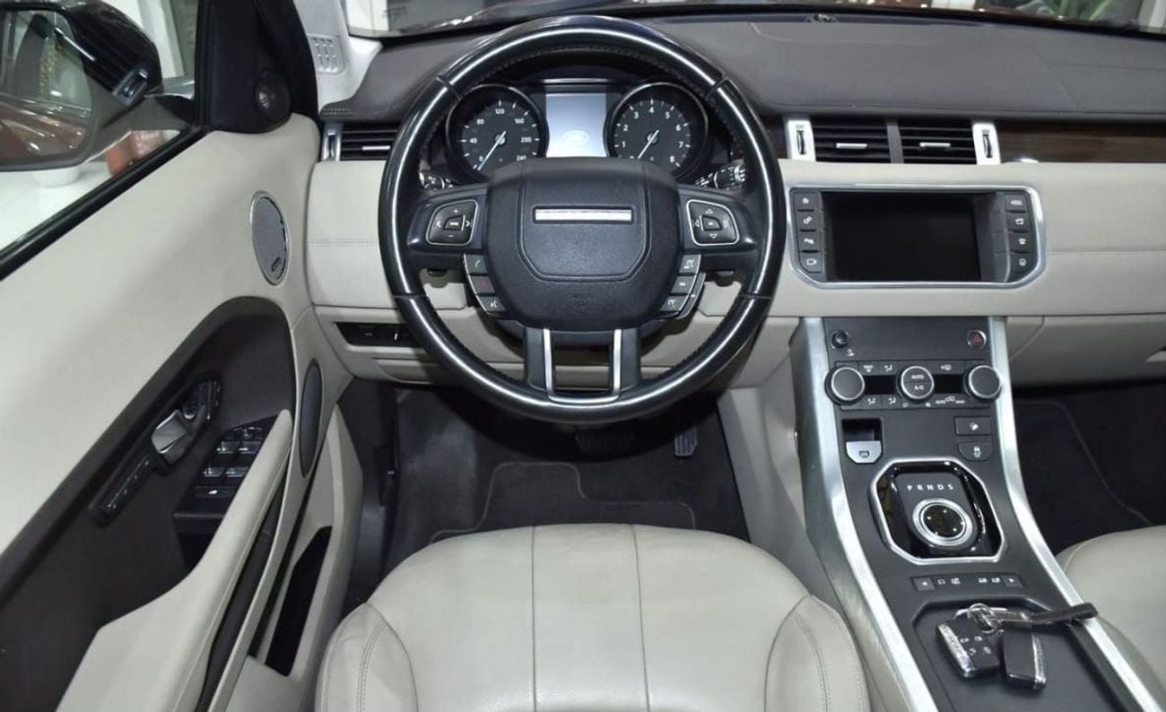 Land Rover Range Rover Evoque HSE EXCELLENT DEAL for our Land Rover Range Rover Evoque ( 2016 Model ) in Red Color GCC Specs