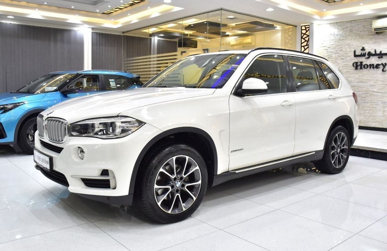 BMW X5 35i EXCLUSIVE EXCELLENT DEAL for our BMW X5 xDrive35i ( 2014 Model ) in White Color GCC Specs