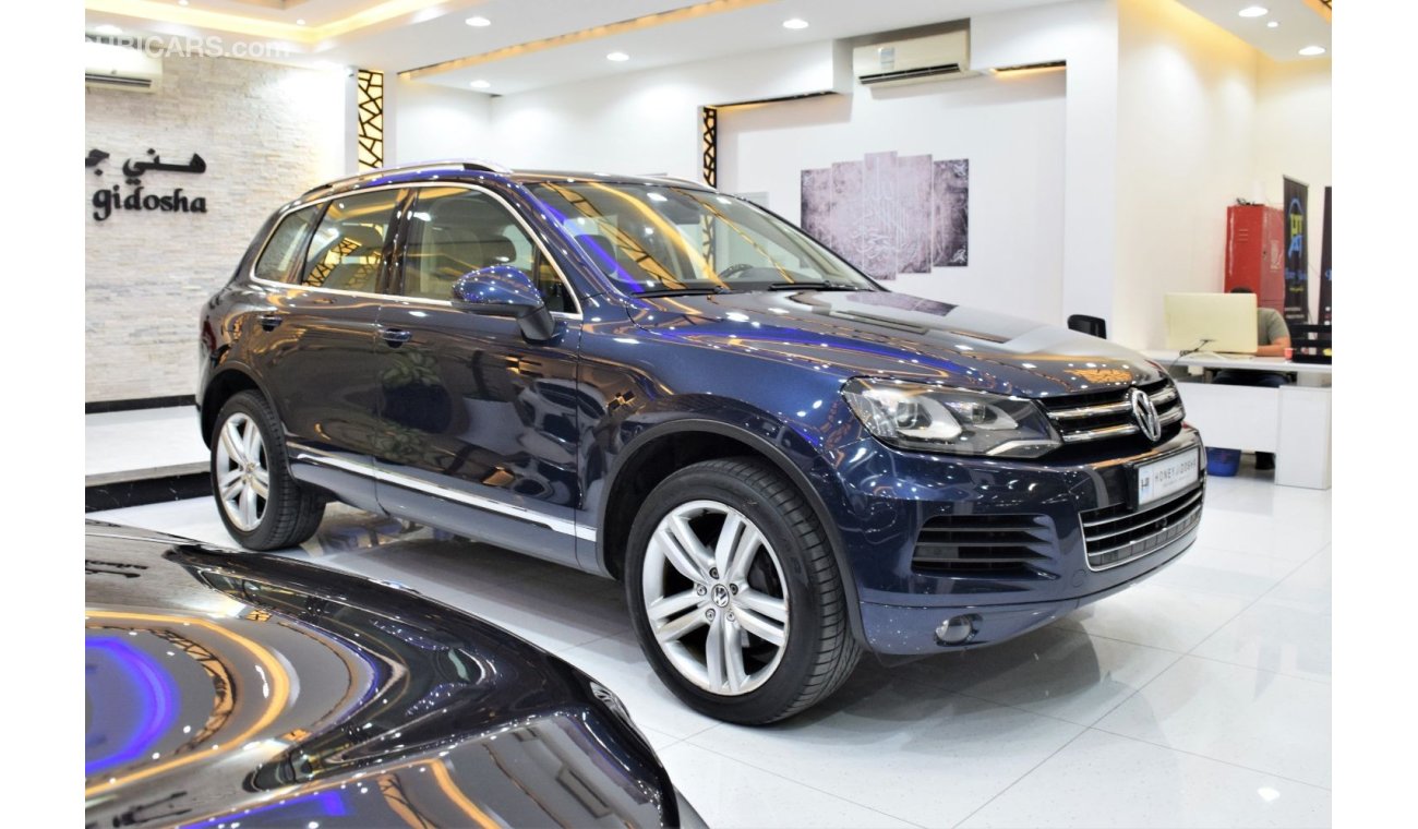 Volkswagen Touareg SEL EXCELLENT DEAL for our Volkswagen Touareg ( 2015 Model! ) in Blue Color! GCC Specs