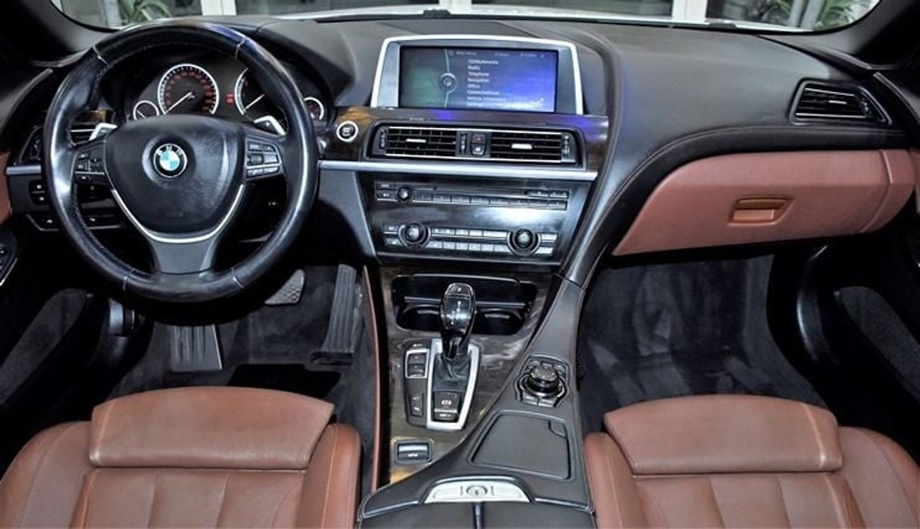 BMW 650i EXCELLENT DEAL for our BMW 650i CONVERTIBLE ( 2011 Model ) in White Color GCC Specs