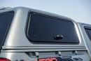 Toyota Hilux A Hilux canopy is a protective shell with a roof, walls, and windows that fits over the tray of a To