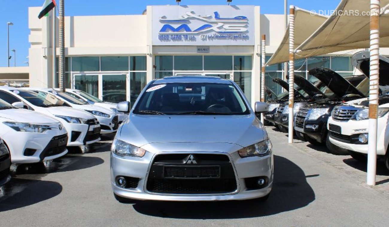 Mitsubishi Lancer ACCIDENTS FREE- ORIGINAL PAINT - 2 KEYS - FULL OPTION - CAR IS IN PERFECT CONDITION INSIDE OUT