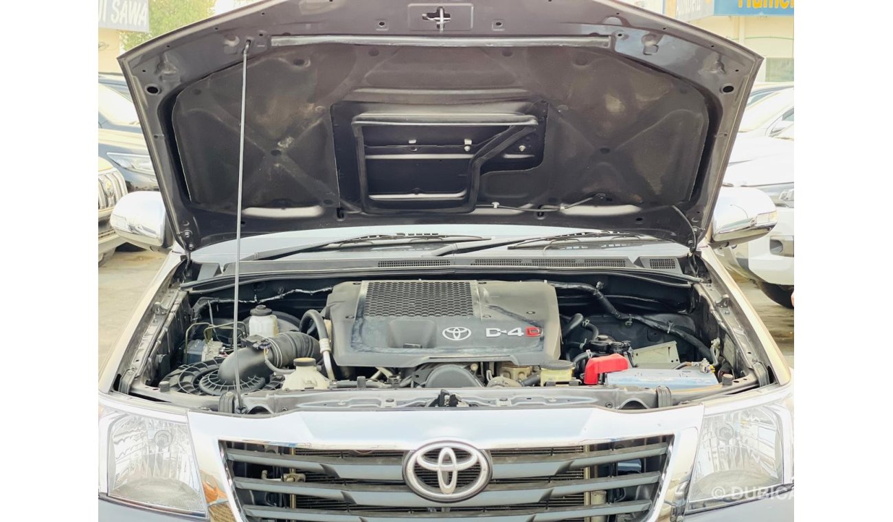 تويوتا هيلوكس Toyota Hilux Diesel engine model 2014 auto gear for sale from Humera motors car very clean and good 