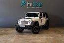 Jeep Wrangler Unlimited Sport 3.6L A/T AED 2,572 pm • 0% Downpayment • Wrangler Unlimited Sport • 1 Year Warranty
