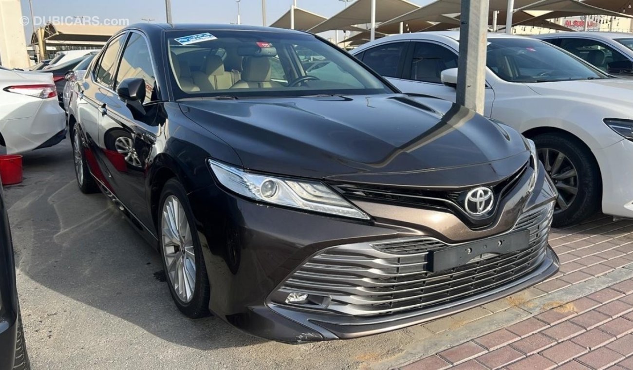 Toyota Camry 2020 GCC model, agency dye, brown color, beige interior, leather hatch, alloy wheels, mirror sensors
