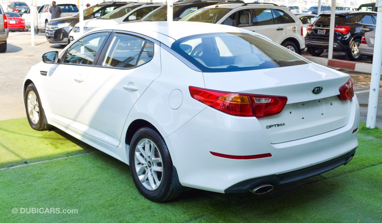 Kia Optima Gulf 2014 white color inside beige No. 2 wheels, cruise control, control wheels, sensors, in excelle