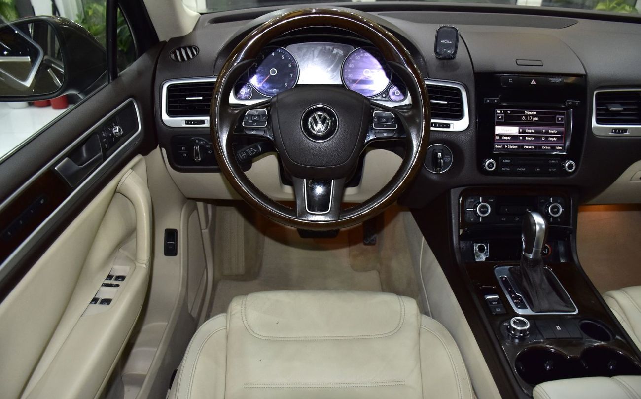 Volkswagen Touareg SEL EXCELLENT DEAL for our Volkswagen Touareg ( 2015 Model ) in Brown Color GCC Specs