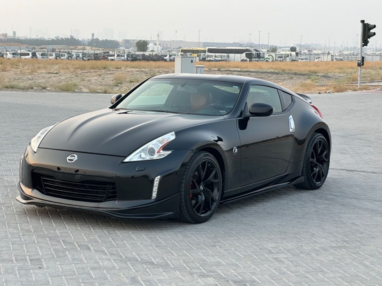 نيسان 370Z سبورت موديل 2016 خليجي فل مواصفات حاله ممتازه من الداخل والخارج مالك واحد من الوكاله