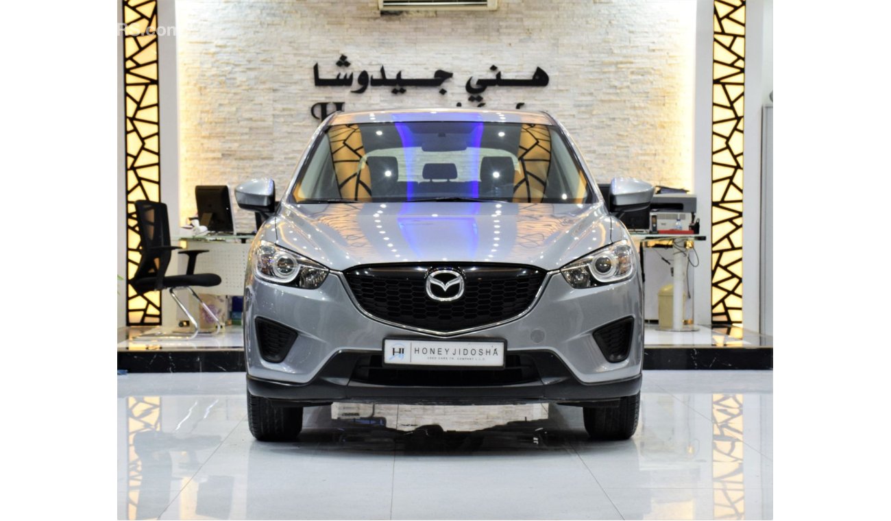 Mazda CX-5 GS EXCELLENT DEAL for our Mazda CX-5 AWD ( 2013 Model! ) in Silver Color! GCC Specs