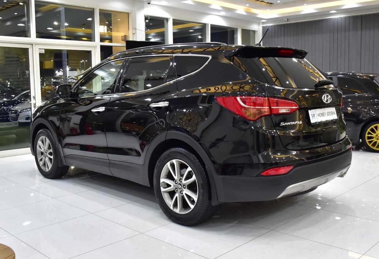 Hyundai Santa Fe EXCELLENT DEAL for our Hyundai SantaFe 4WD 3.3L ( 2014 Model ) in Black Color GCC Specs