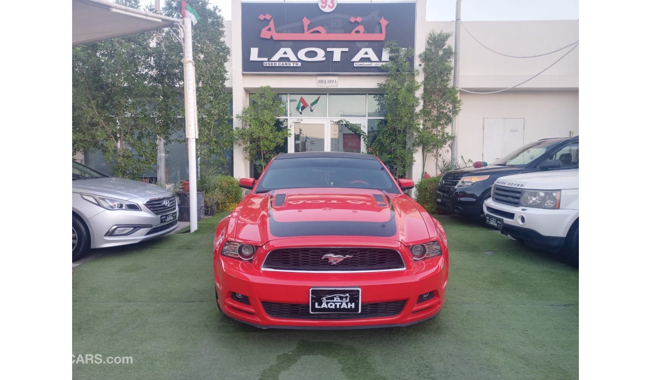 Ford Mustang 2014 GCC model, coupe, cruise control, rear camera, leather rear spoiler, in excellent condition