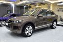 Volkswagen Touareg SEL EXCELLENT DEAL for our Volkswagen Touareg ( 2015 Model ) in Brown Color GCC Specs