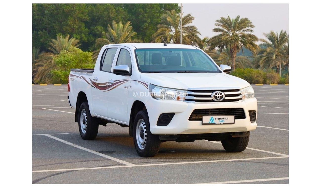 تويوتا هيلوكس GL 2019 2.7L 4X4 DOUBLE CAB A/T PETROL | GCC SPECS - LIKE NEW CONDITION READY TO DRIVE