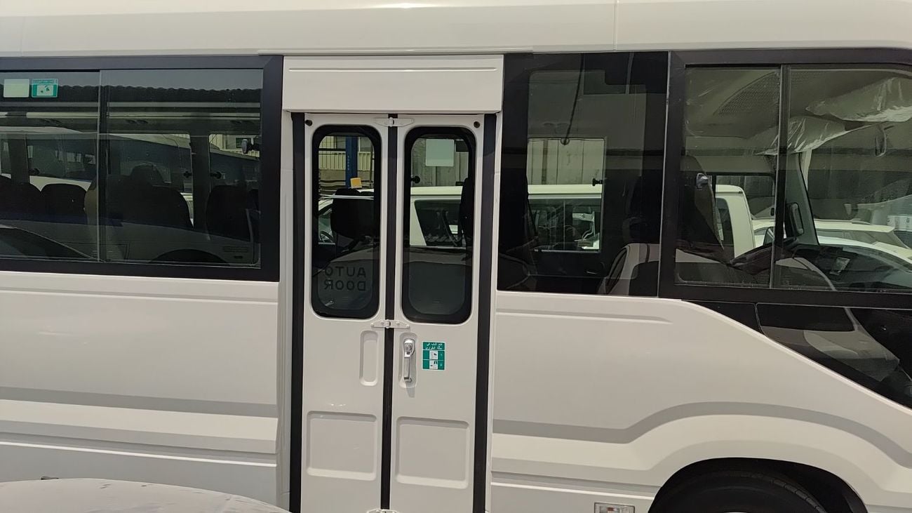 تويوتا كوستر ECTTAE004 - 2025 Toyota Coaster - 4.0L Diesel Manual – 23 Seats, Auto Door, 3PSB, Mic, Baggage Rack 