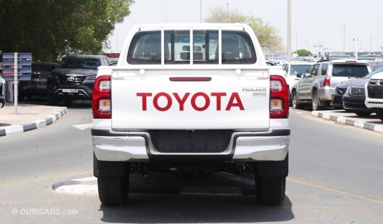 Toyota Hilux 2.4L diesel  . White 2024 model, M/T Wide body with Chrome bumper