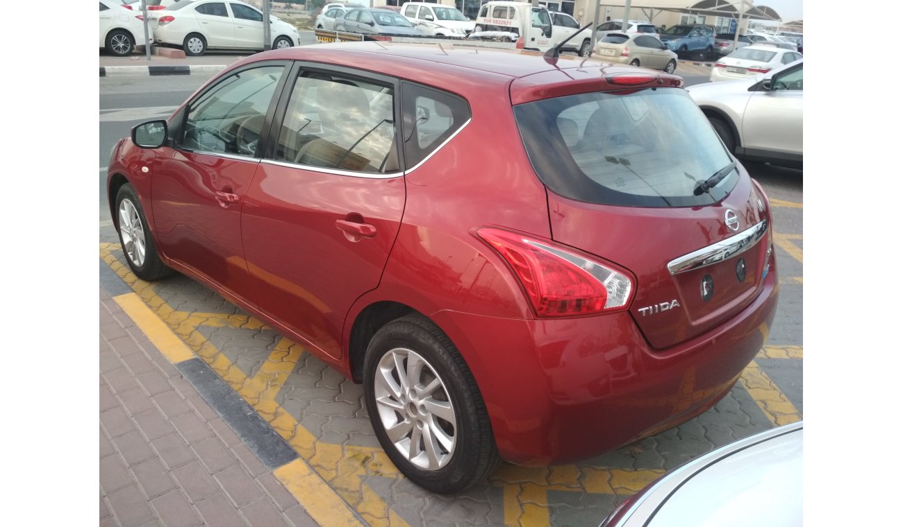 Nissan Tiida 2014 RED GCC NO PAIN NO ACCIDENT PERFECT
