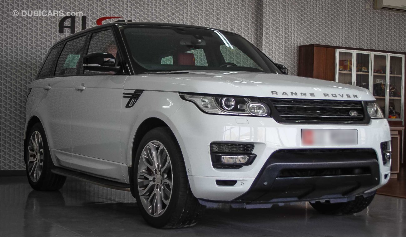 Land Rover Range Rover Sport Supercharged رنج روفر سبورت V8 2014 من وكالة الطاير  147000 كم لون ابيض و الداخل احمر بدون حوادث او صبغ تحت الضما