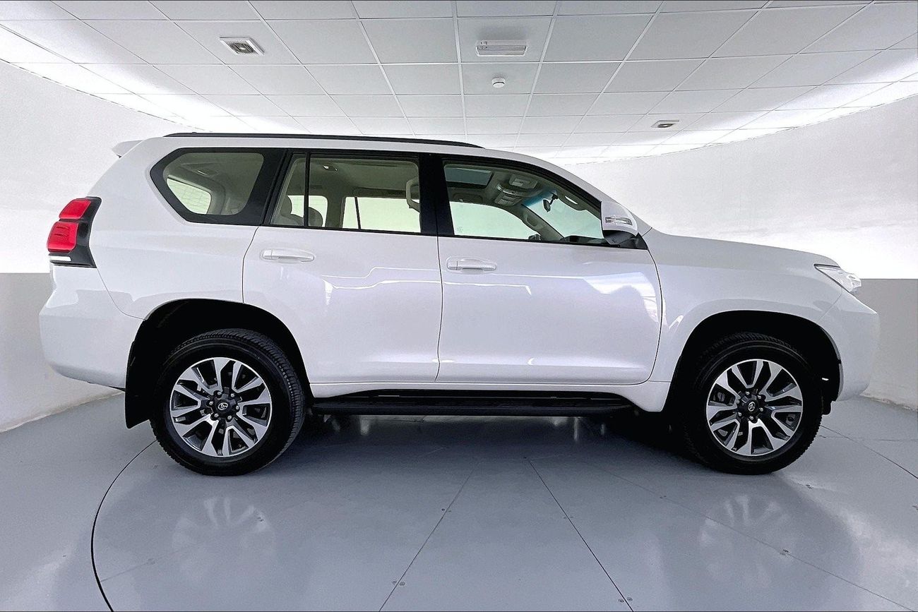 Toyota Prado GXR| 1 year free warranty | Flood Free