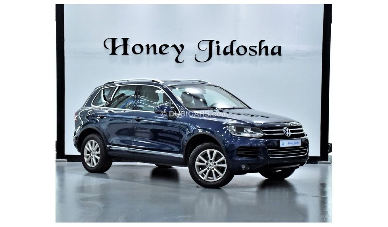 Volkswagen Touareg EXCELLENT DEAL for our Volkswagen Touareg ( 2011 Model! ) in Blue Color! GCC Specs