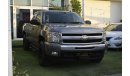 Chevrolet Silverado Pickup model 2009 imported silver color, equipped with two side halves, tyote wheels, sensors cruise