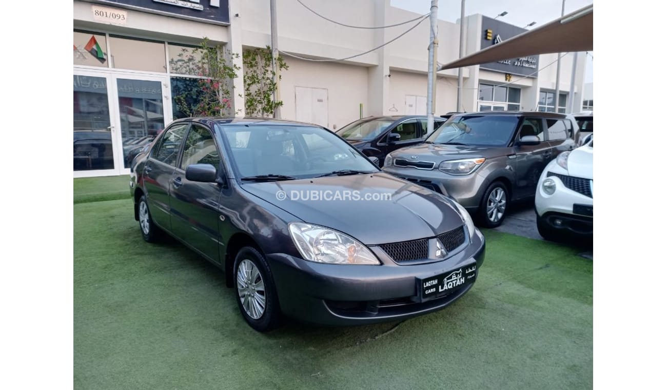 ميتسوبيشي لانسر خليجي 2009 تكييف باورأوتوماتيك سنتر لوك جناح خلفى بحالة ممتازة جدا لاتحتاج الي أى مصاريف