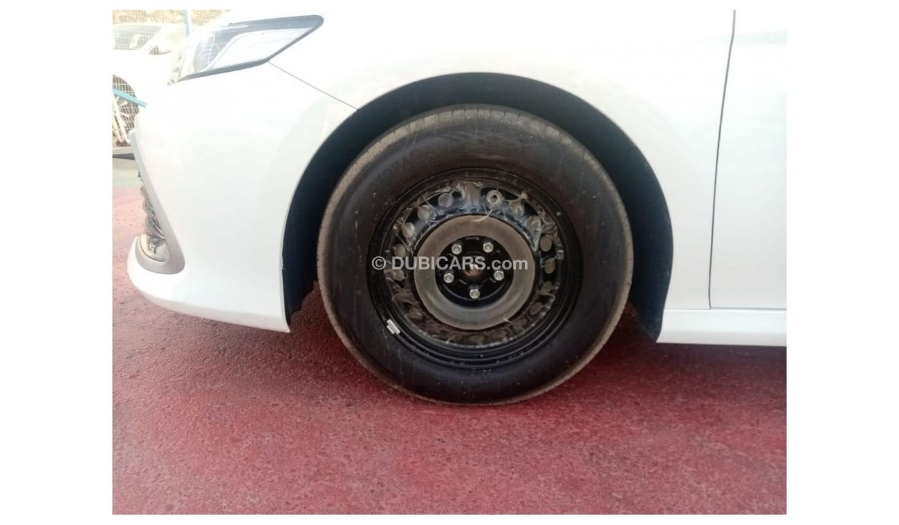 Toyota Camry LE 2022  White inside beige 2.5L petrol 4 Cylinder